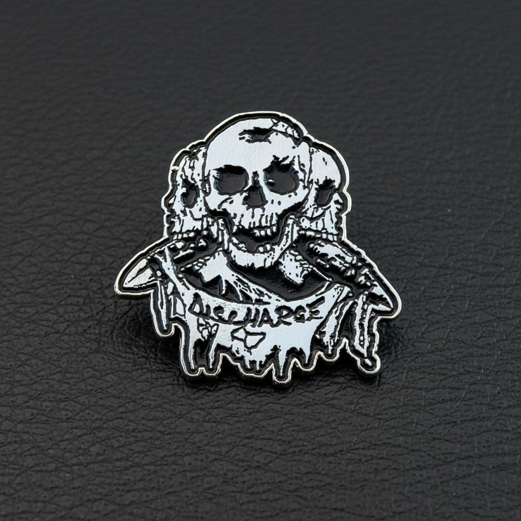Discharge - Skulls logo metal pin