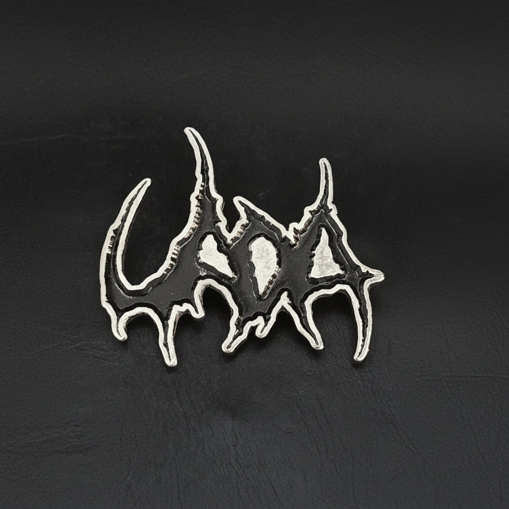 Uada - Logo metal pin